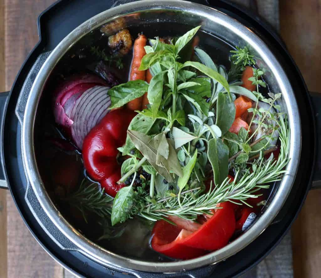 Healthy Instant Pot Beef Bone Broth in an Instant Pot with vegetables