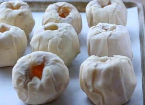 Pan of dough covered apples ready to be flash frozen from Gourmet Done Skinny
